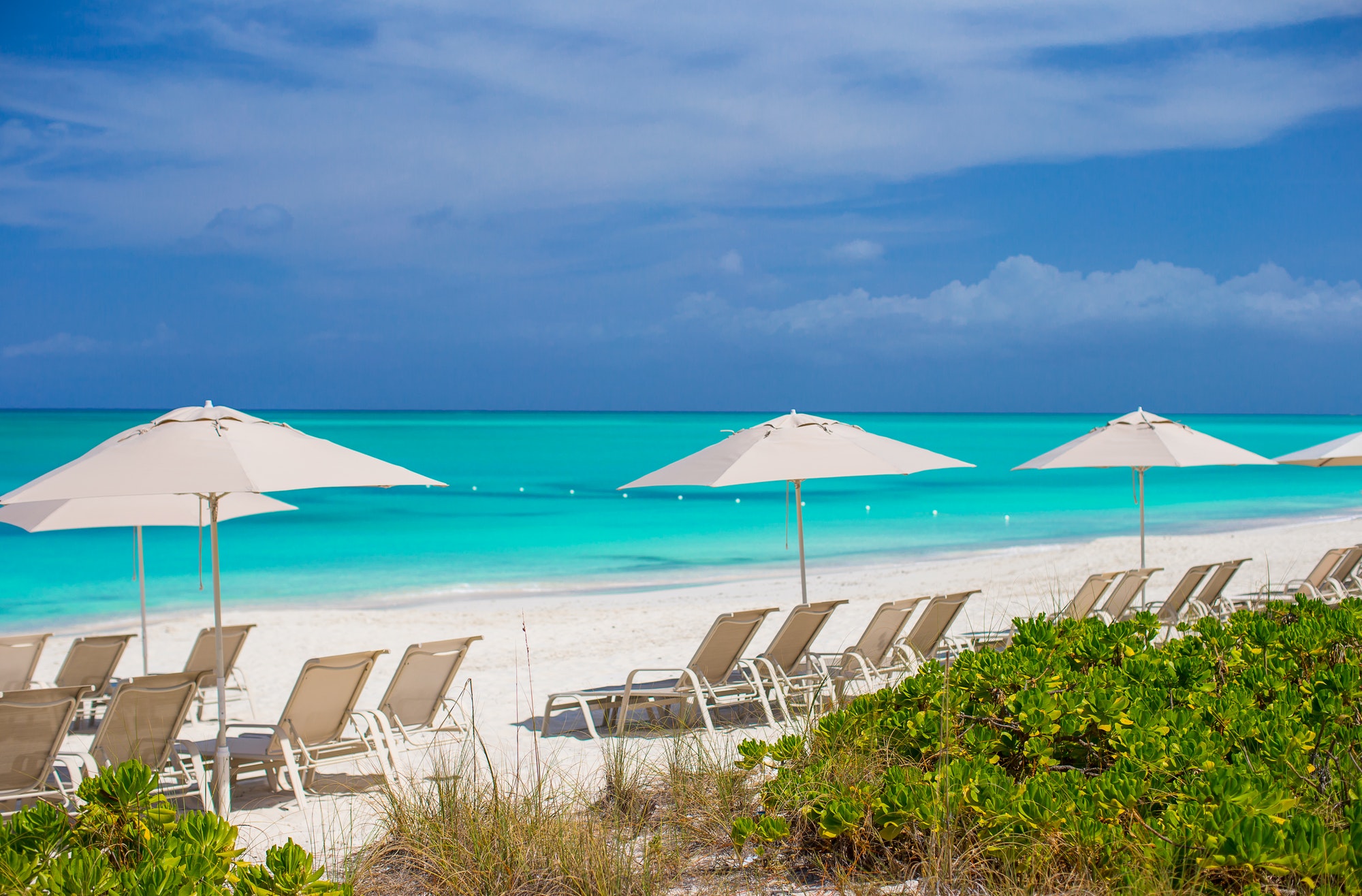 beach-chairs-on-exotic-tropical-white-sandy-beach.jpg